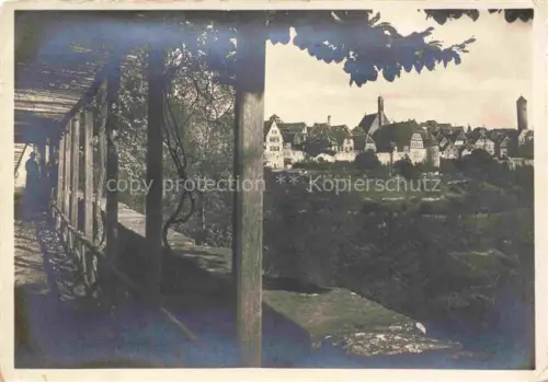 AK / Ansichtskarte ROTHENBURG   TAUBER Bayern Laubengang Altstadt Stadtmauer Tuerme Haeuser Holzgelaender Hang