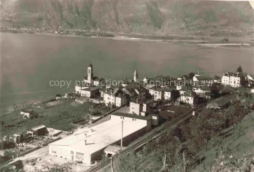 AK / Ansichtskarte Vira-Gambarogno Locarno TI Gambarogno Lago-Maggiore Kirchturm Ortszentrum Bahnlinie Berge Fabrik