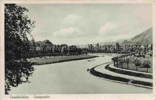 AK / Ansichtskarte SAARBRueCKEN Saarland Saarpartie Saar Fluss Promenade Baeume Park Ruderboote