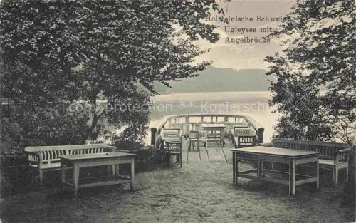AK / Ansichtskarte Ugleysee Ukleisee Eutin Schleswig-Holstein Angelbruecke See Baeume Baenke Tische Steg Seeufer