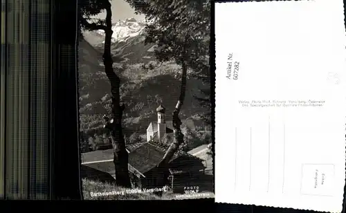 607282,Foto Ak Bartholomäberg Ansicht Kirche Baum i. Vordergrund