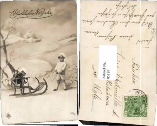 85184,Neujahr Junge m. Schlitten Rodel