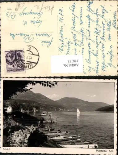 378737,Millstätter See b. Millstatt Anlegestelle Ruderboote Boote Bergkulisse
