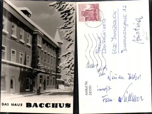243391,Villach Das Haus Bacchus Weinstüberl Winterbild