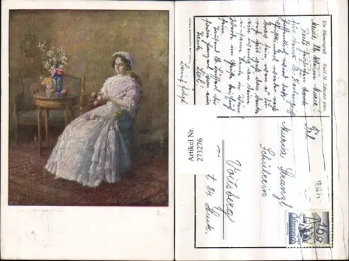 273276,Künstler AK Karl M. Schuster Ein Blumengruß Fraum. Kleid Rosen Stuhl Tisch