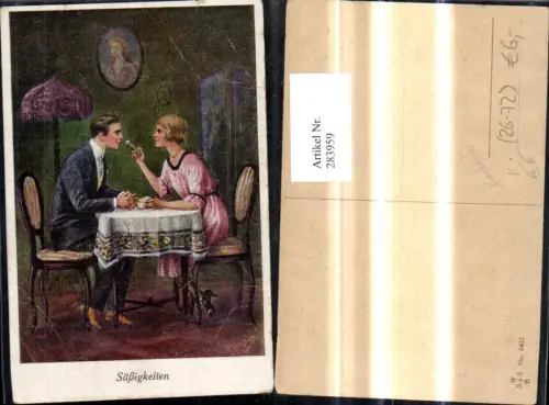 283959,Künstler Ak F. Kaskeline Süßigkeiten Liebe Paar Essen a. Tisch