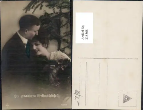 338568,Foto Ak Liebe Paar Umarmung Tannenzweig Weihnachten