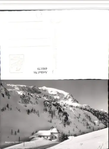 490179,Obertauern Bergkirche Kirche Bergkulisse Winterbild