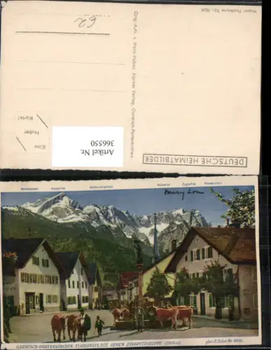 366550,Garmisch-Partenkirchen Floriansplatz Brunnen Bergkulisse pub Foto H. Huber 8036