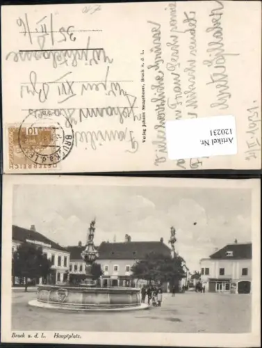 120231,Bruck a.d. Leitha Hauptplatz Brunnen Leute Gasthaus
