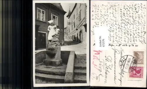 672576,Foto Ak Krems a. d. Donau Brunnen Statue Gasse