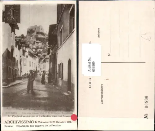658869,Cremieu Rue des Augustins et le Chateau Delphinal France