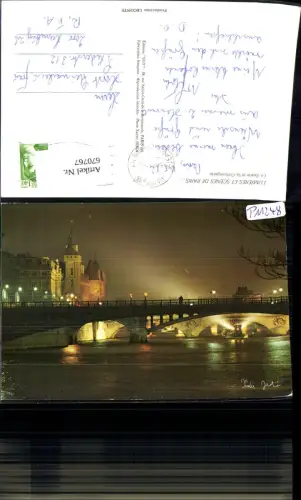 670767,Paris La Seine et la Conciergerie Brücke Nebel b. Nacht France