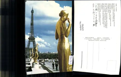 670792,Paris La Tour Eiffel Les Statues en bronze dore sur la terrasse du Palais du Trocadero France