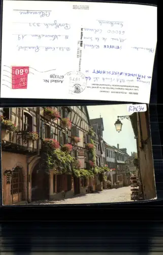 671338,Riquewihr Les vieilles maisons fleuries de la grand rue Fachwerkhäuser France