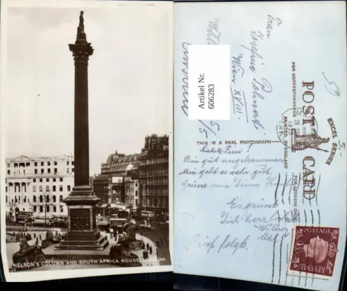 606283,London Nelsons Column and South Africa House Statue Great Britain