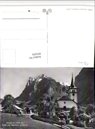 495458,Grindelwald Kirche geg. Wetterhorn Bergkulisse Kt Bern