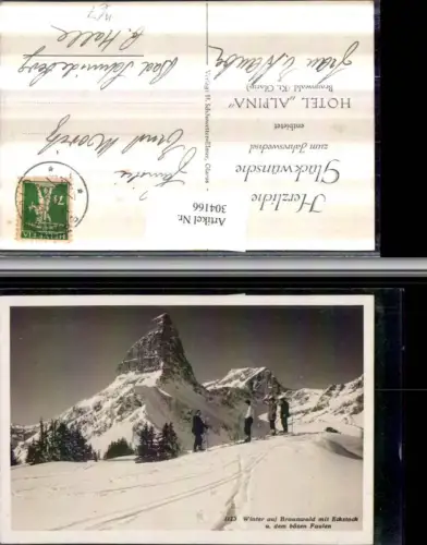 304166,Braunwald Eckstock u. Böser Faulen Bergkulisse Skifahrer Winterbild Kt Glarus