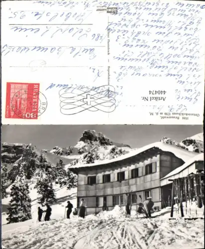 440474,Braunwald Ortstockskihaus Bergkulisse Winterbild Kt Glarus