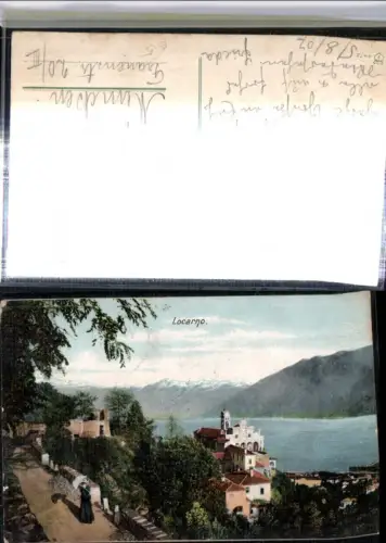 309782,Locarno Kirche Frau m. Schirm Bergkulisse Kt Tessin