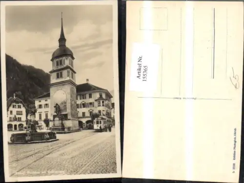 155365,Altdorf Tellsplatz Telldenkmal Brunnen Statue Strassenbahn u. Personen Kt Uri