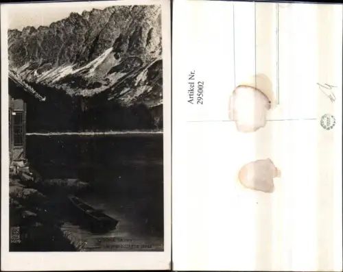 295002,Vysoke Tatry U popradskeho plesa See Bergkulisse Ruderboot