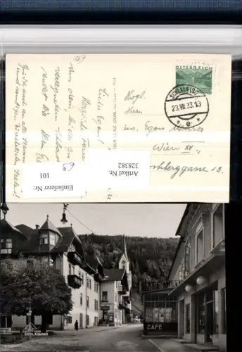 328382,Schladming Straßenansicht Cafe Kirchenturm Frisier Salon