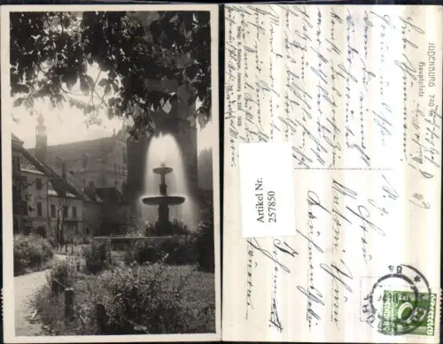 257850,Judenburg Hauptplatz Brunnen Kirche Turm