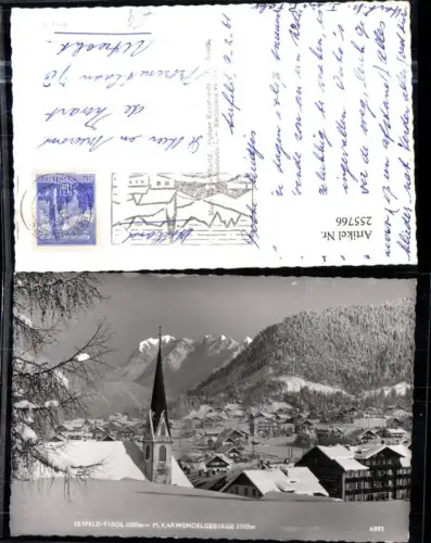 255766,Seefeld Teilansicht Kirche m. Karwendelgebirge Bergkulisse Winterbild