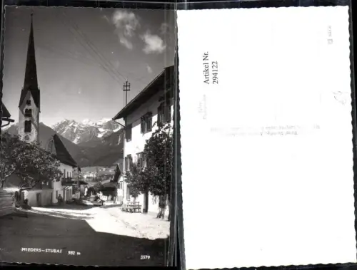 294122,Mieders im Stubai Straßenansicht Kirchenturm Bergkulisse
