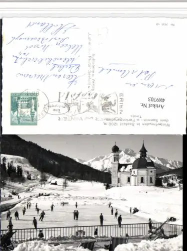 489703,Seefeld Kirche Eislaufplatz Bergkulisse Winterbild