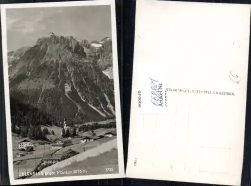 668821,Foto Ak Obernberg am Brenner geg. Tribulaun Ansicht m. Kirche