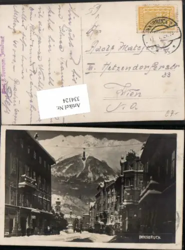 334124,Innsbruck Maria Theresienstraße Bergkulisse Winterbild pub Foto F. Sprenger