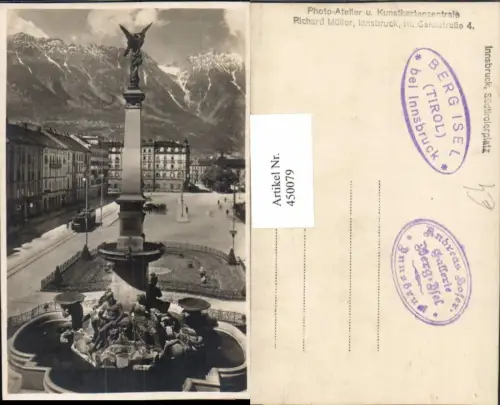 450079,Innsbruck Südtirolerplatz Brunnen Säule Bergkulisse