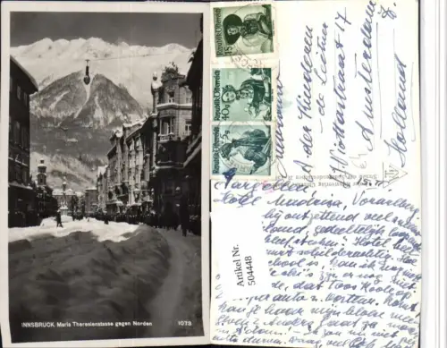 504448,Innsbruck Maria Theresienstraße Straßenansicht Bergkulisse Winterbild