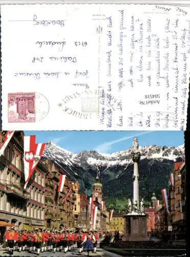 504518,Innsbruck Maria-Theresien-Straße Annasäule Trachtenkapelle Bergkulisse