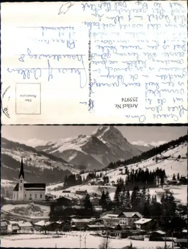 255974,Kirchberg in Tirol Teilansicht Kirche m. Großem Rettenstein Bergkulisse Winterbild