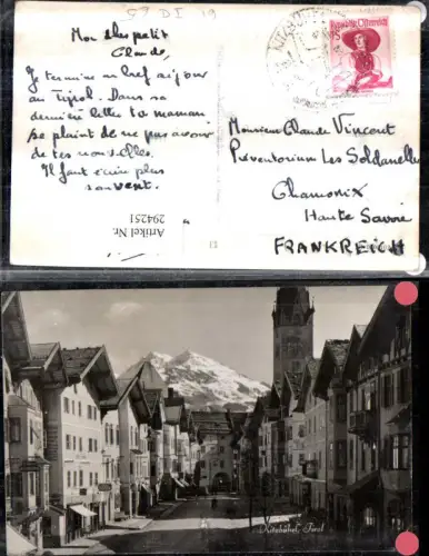 294251,Kitzbühel Straßenansicht Geschäfte Turm Bergkulisse