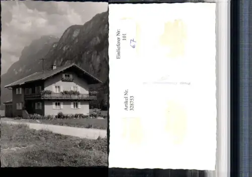 328753,Foto AK Kössen Hausansicht Bergkulisse