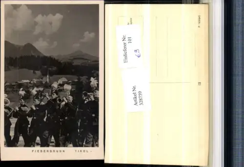 328759,Foto AK Fieberbrunn Totale Musikkapelle Bergkulisse