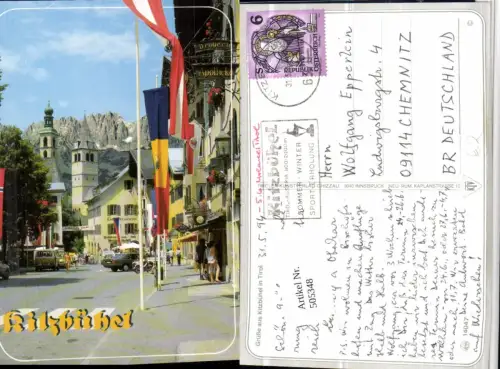 505348,Kitzbühel Straßenansicht Kirchturm Bergkulisse