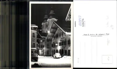 668847,Foto Ak Sankt Johann in Tirol Gasthof Post im Winter b. Nacht VW Käfer