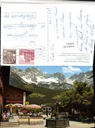 519052,Ellmau Floriani-Brunnen VW-Käfer Bergkulisse