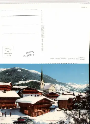 519082,Alpbach Teilansicht Kirche Bergkulisse Winterbild pub Risch-Lau