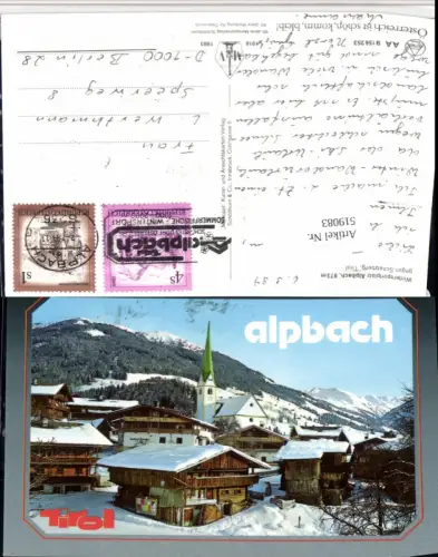 519083,Alpbach Teilansicht Kirche Bergkulisse Winterbild