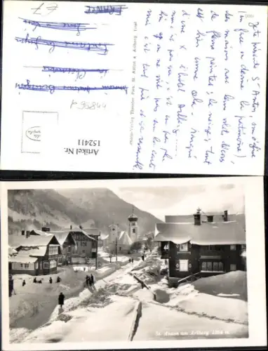 152411,St Anton a. Arlberg Winteransicht Strasse Kirche Personen