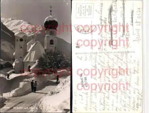 471748,St. Anton am Arlberg Kirche Bergkulisse Winterbild