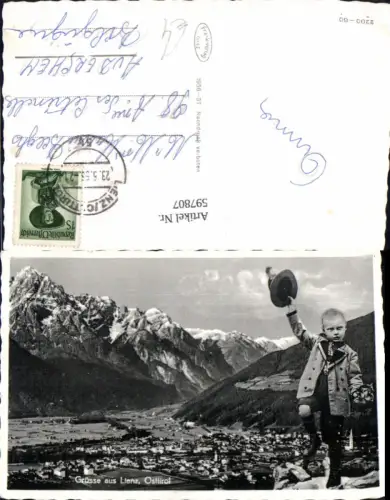 597807,Fotomontage Lienz Totale Bub Junge Tracht Hut