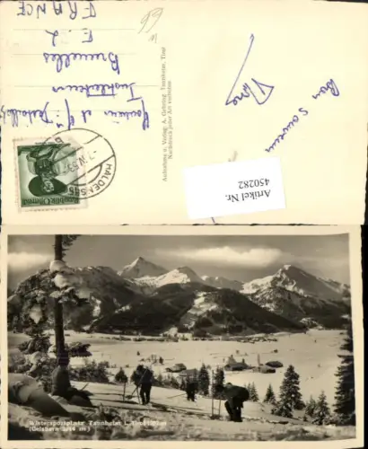 450282,Tannheim in Tirol Totale Bergkulisse Tourengeher Winterbild