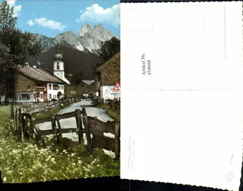 454688,Tannheim Straßenpartie Kirche m. Rotflüh Bergkulisse